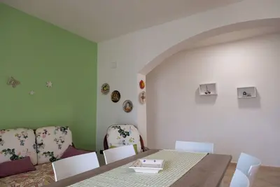 Image de Green House, your oasis of relaxation just 100 meters from the beach!