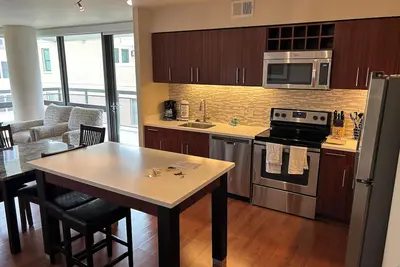 Image de Spacious New 2br/2ba furnished Va/Dc area. Top-Notch Amenities!