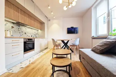 Image de Apartment in the center of the district Wola, close to the subway.
