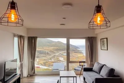 Image de Modern apartment with Beagle Channel view