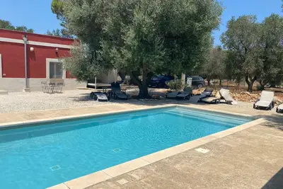 Image de Trullo 'L' Estate' avec piscine privée, Wi-Fi et climatisation