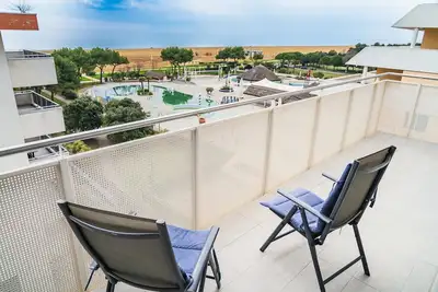 Image de Appartement en bord de mer dans un immeuble moderne à Bibione