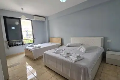 Image de Tirent Apartment - Cozy Bedrooms Stay by Golem Beach.