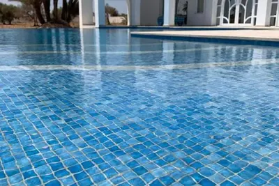 Image de Olive house. Villa unique avec grande piscine à débordement et salle de cinéma