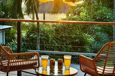 Image de 37 steps to Playa Potrero from the back door. Pool, Sleeps 6! Sunsets galore!