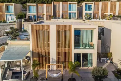 Image de Seaside Retreat | Green Coast