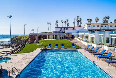 Dog-friendly home 3 rows to beach with rooftop deck, pool, hot tub, & kitchen