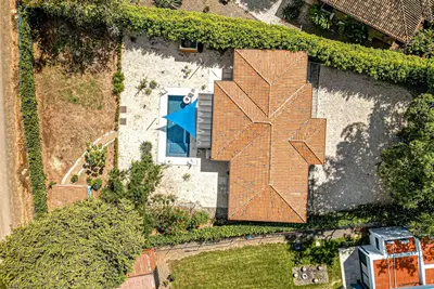 Well-equipped tropical retreat with a private pool, grill, open layout, & W/D