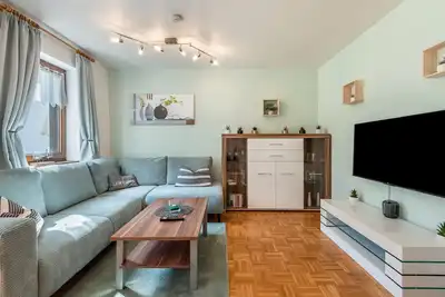 Image de Appartement de vacances 'Fewo mit Kamin - Chiens bienvenus' avec vue sur la montagne, terrasse et Wi-Fi