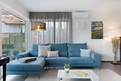 Image de Appartement 'Vinea Guesthouse Garden' avec vue sur les montagnes, Wi-Fi et climatisation