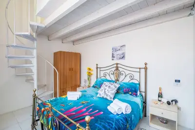 Image de Maison de vacances 'Rhapsody By The Sea' avec vue sur la mer, jardin privé et climatisation