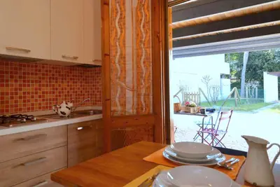 Image de Jardin privé et salon chaleureux