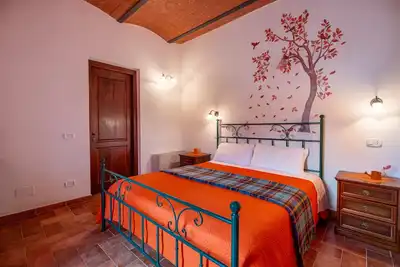 Image de Chambre 'Arancione' avec piscine et jardin partagés