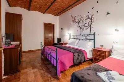 Image de Chambre \"Rosa\" avec piscine et jardin partagés