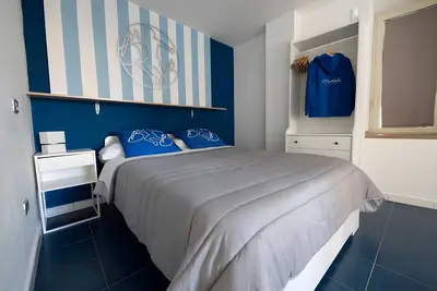 Image de Chambre 'Murales - Camera Azure' avec balcon, Wi-Fi et climatisation