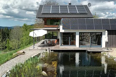 Image de Maison de vacances 'Am Teich' avec vue sur la montagne, terrasse privée et Wi-Fi