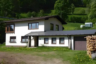 Image de Maison de vacances 'Am Bach' avec vue sur les montagnes, terrasse privée et Wi-Fi