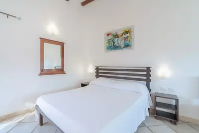 Image de Chambre 'Al Palmento Relais - Etna Rosso R5' avec piscine partagée, Wi-Fi et climatisation