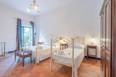 Image de Chambre 'Al Palmento Relais - R3' avec piscine partagée, Wi-Fi et climatisation