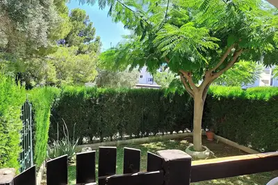 Image de 2-bedroom apartment with Ac, private garden, next to calas and natural park