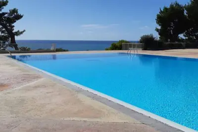 Image de Grand studio climatisé (4 couchages) bord de mer avec plage, piscines, tennis. . .