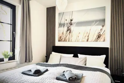 Image de City Apartment Osnabrück -- including parking & WiFi, kitchen with dishwasher