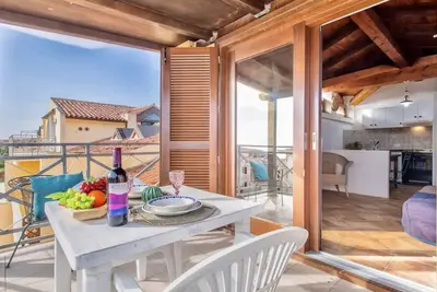 Image de Air-conditioned apartment a few meters from the sea of ​​about 40 square meters characterized by simple and functional furnishings, located on the first floor and composed of a living room with kitchenette and sofa bed, a bedroom with double bed, bat