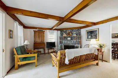 Lakefront dog friendly cottage w/ a dock & beautiful sunset views