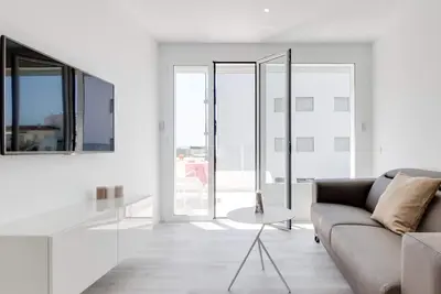 Image de Apartamento en segunda línea de playa, dos dormitorios con terraza y jacuzzi comunitario en la azotea