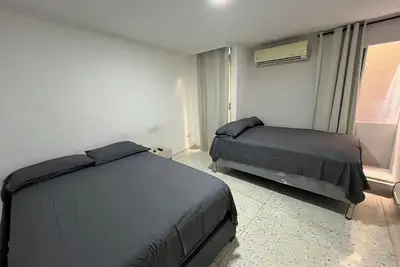 Image de 3 bedroom apartment with private bathroom and air located north of the city.