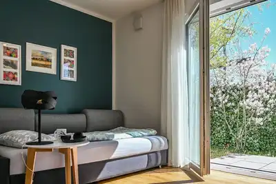 Image de Cozy first floor apartment with covered terrace - ideal for 4-legged friends.