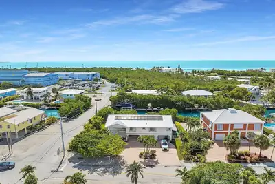 3/2 with canal front home pool and dock - open concept