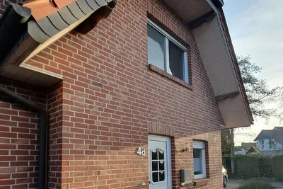Image de Maison de vacances 'Mellumring' avec terrasse privée, jardin partagé et Wi-Fi