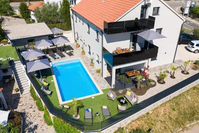 Image de Villa LuiSole Apartment °4 - promises a harmonious blend of elegance, comfort, and practicality, ensuring an unforgettable stay in this idyllic destination.