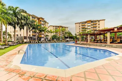 Family-friendly coastal escape with pool, balcony & modern comforts