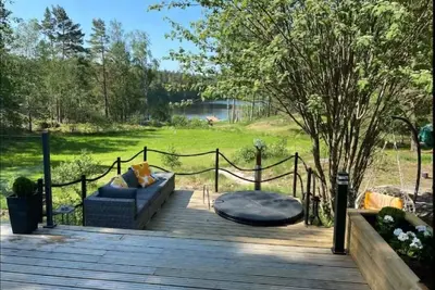 Image de Cabin with own lake and palju hot tub