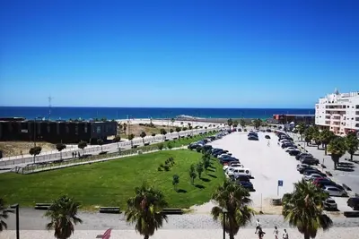 Image de 2ºF Costa Azul · CaparicaT2 com vista mar, ideal p