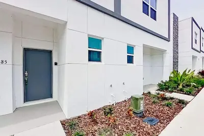 Image de 5br/3ba Villa • Private Pool • Grill • Near Disney