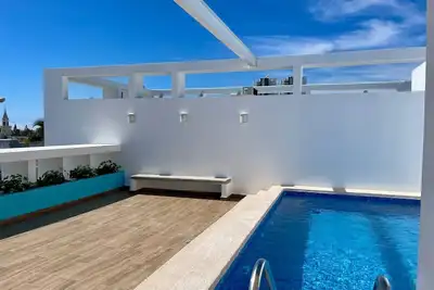 Image de Ideal para parejas! Loft con alberca & Zona Dorada