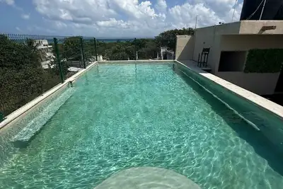 Image de Affordable apartment #11 with a rooftop terrace and pool, near the sea. Tower 70