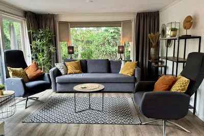 Image de Experience an unforgettable holiday in our cozy Cozy Lodges, perfect for 4 persons! These detached accommodations of approximately 60m² offer plenty of space and comfort, situated on a beautiful plot in the heart of the Veluwe nature.