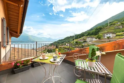 Image de Appartement de vacances \"Orchidea Terrazzo Sul Tetto\" avec balcon, piscine partagée et Wi-Fi