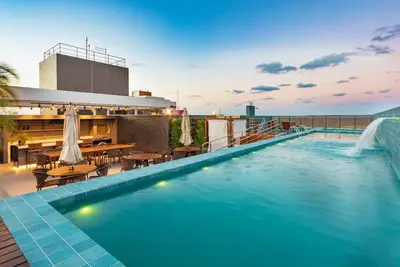 Image de Beautiful flat in João Pessoa, with swimming pool, just a few meters from the beach