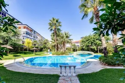 Image de Appartement 'Con Piscina' avec piscine partagée, Wi-Fi et climatisation