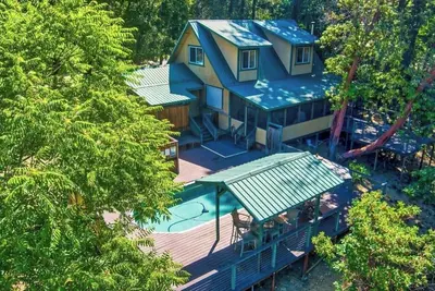 Image de Peaceful 2-bedroom house with river views, pool, laundry, full kitchen & more