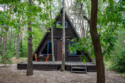 Image de 3 A-shaped cottages in a beautiful forest 1 hr drive from Warsaw