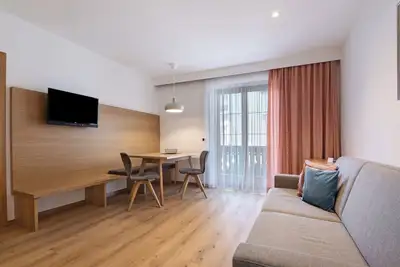 Image de Appartement 'Schnatzhof A2' avec vue sur les montagnes, piscine partagée et Wi-Fi