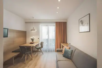 Image de Appartement 'Schnatzhof Typ A8' avec vue sur les montagnes, piscine partagée et Wi-Fi