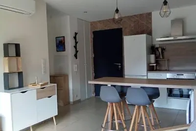 Image de Appartement idéal pour vos vacances avec un extérieur équipé et place de parking