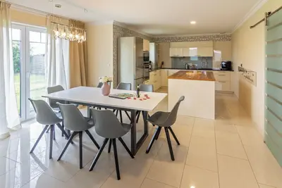 Image de Large, modern vacation home in the heart of Norddeich, for up to 8 people.